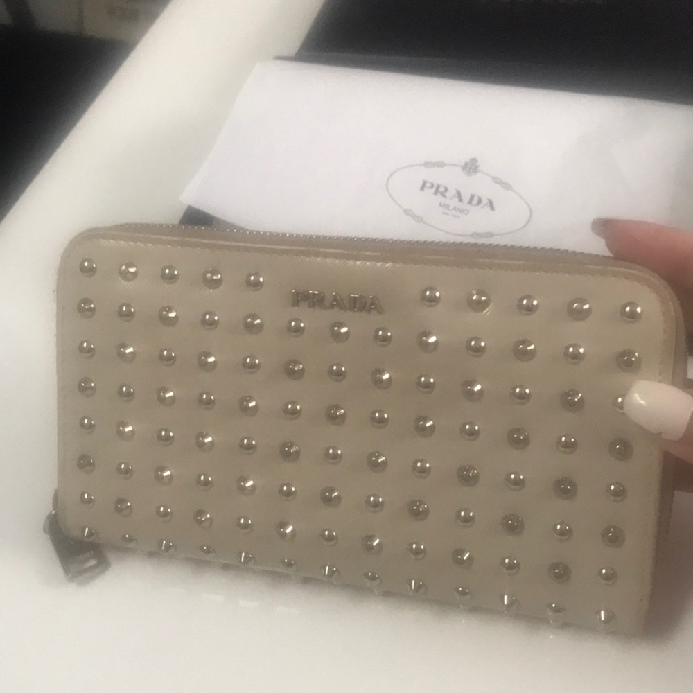 Prada authentic studded cream wallet